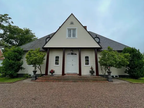 House with freshly painted facade – after