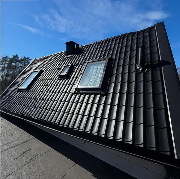 Clay-tile roof with roof windows – after
